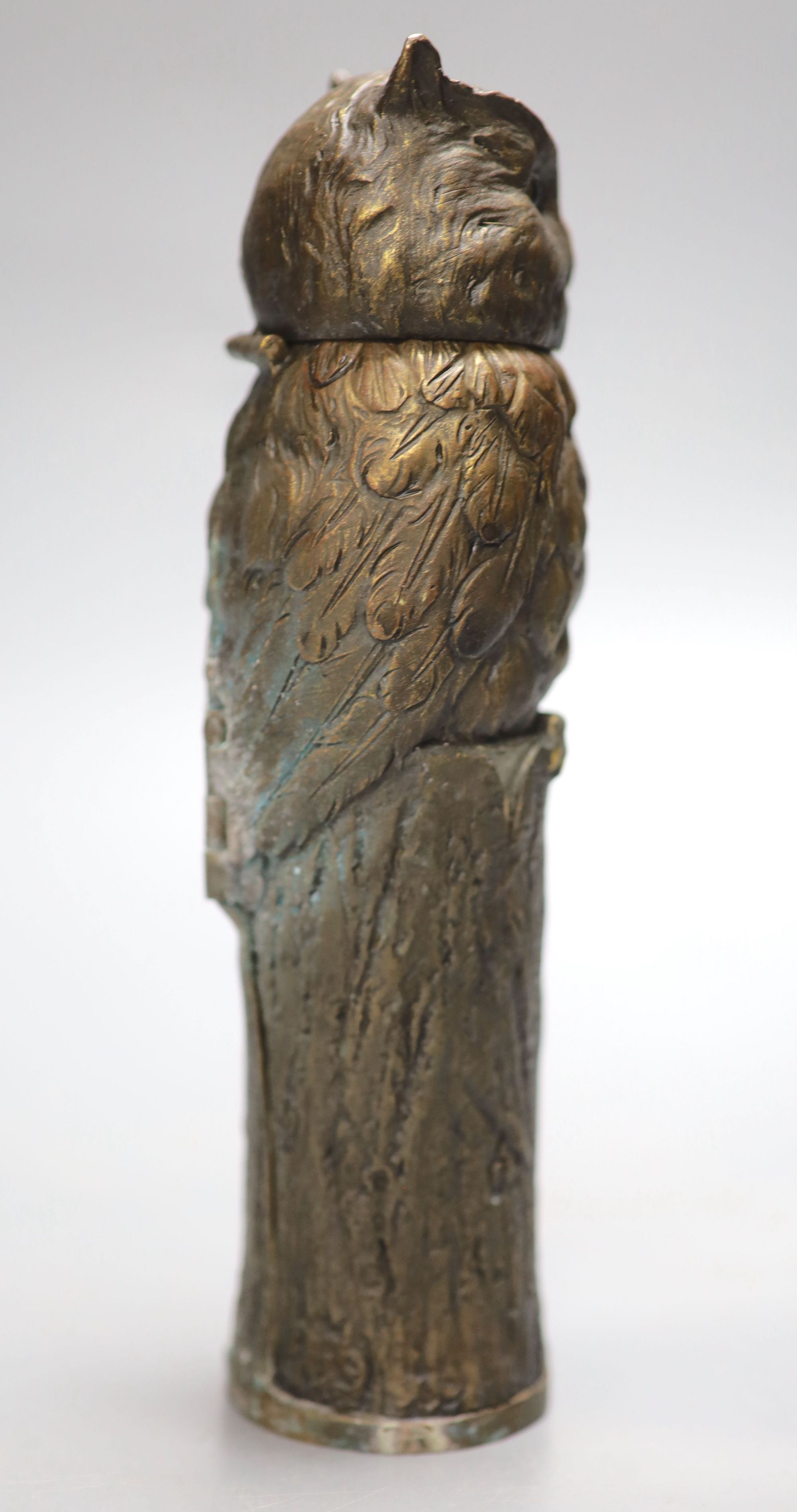 After Bergman. A bronze of an owl embracing a nude lady, height 19cm